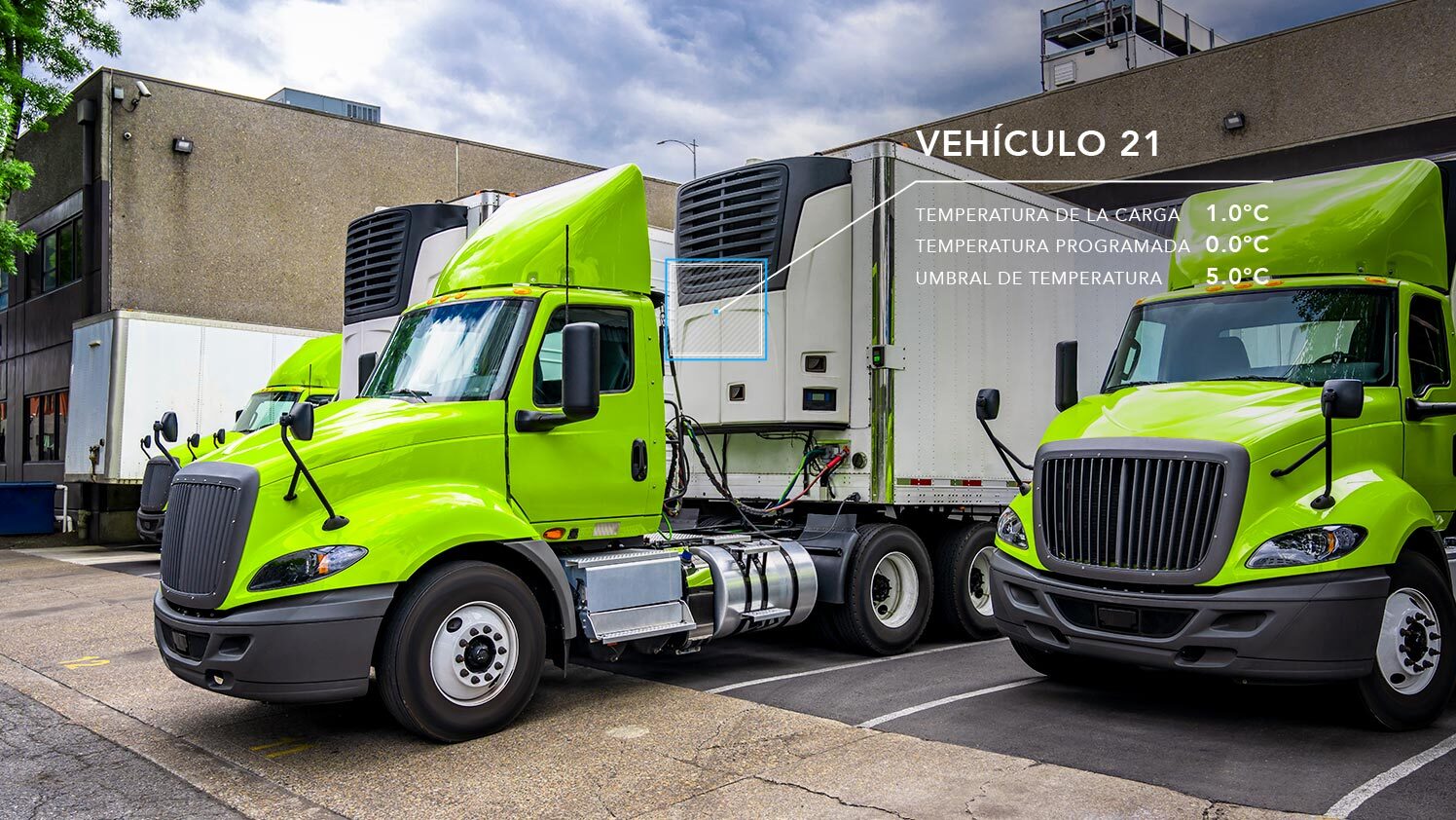 image of two green trucks