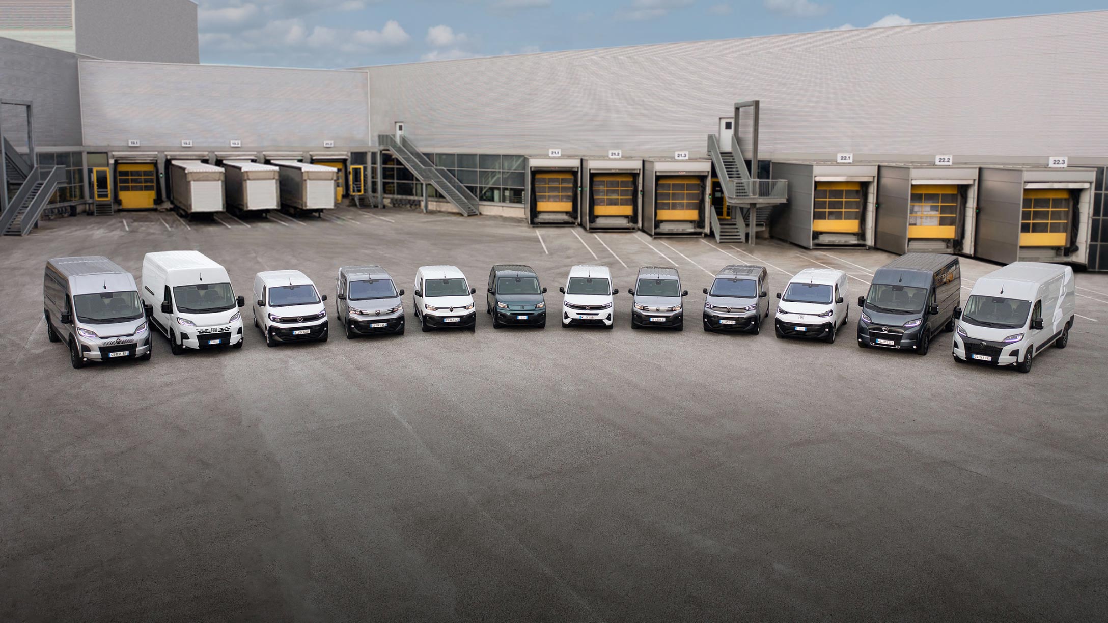 Photo of a group of Stellantis veichles in a outdoor car garage