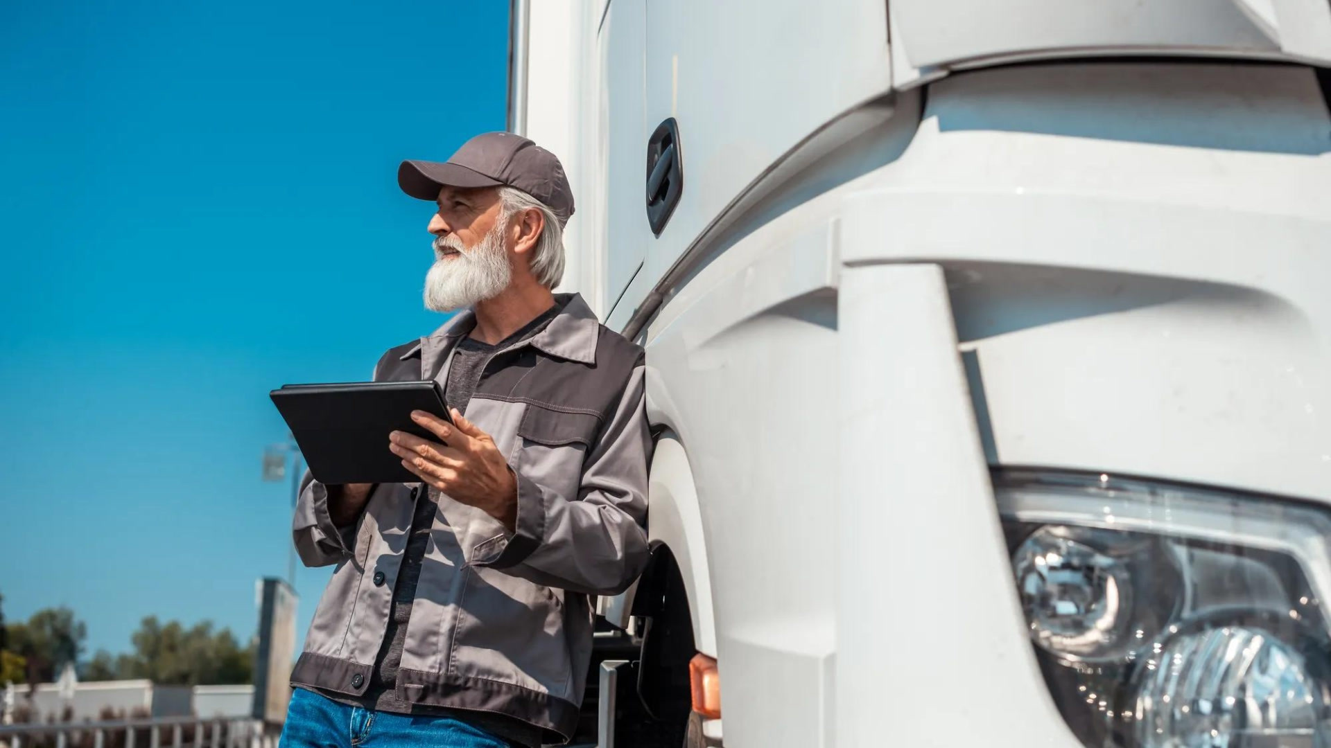 person standing against truck