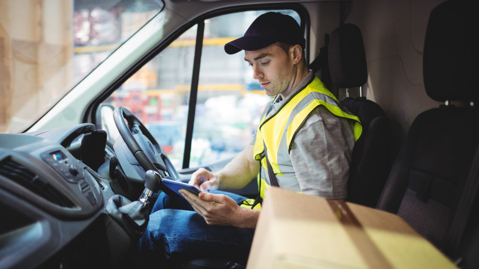 A guy that is delivering a package