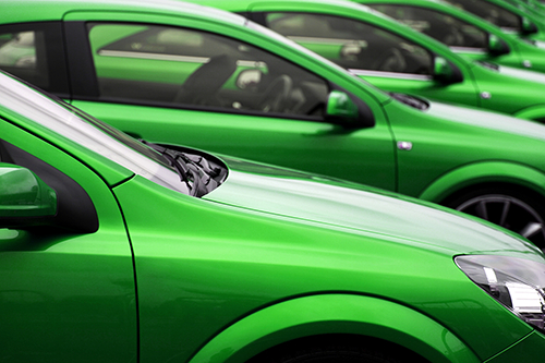 Green vehicles.