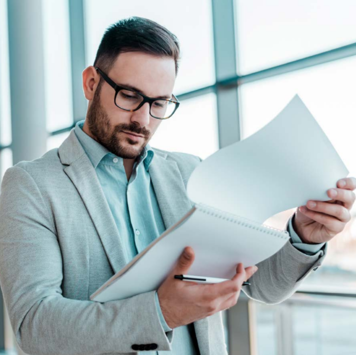 Professional man reading a report