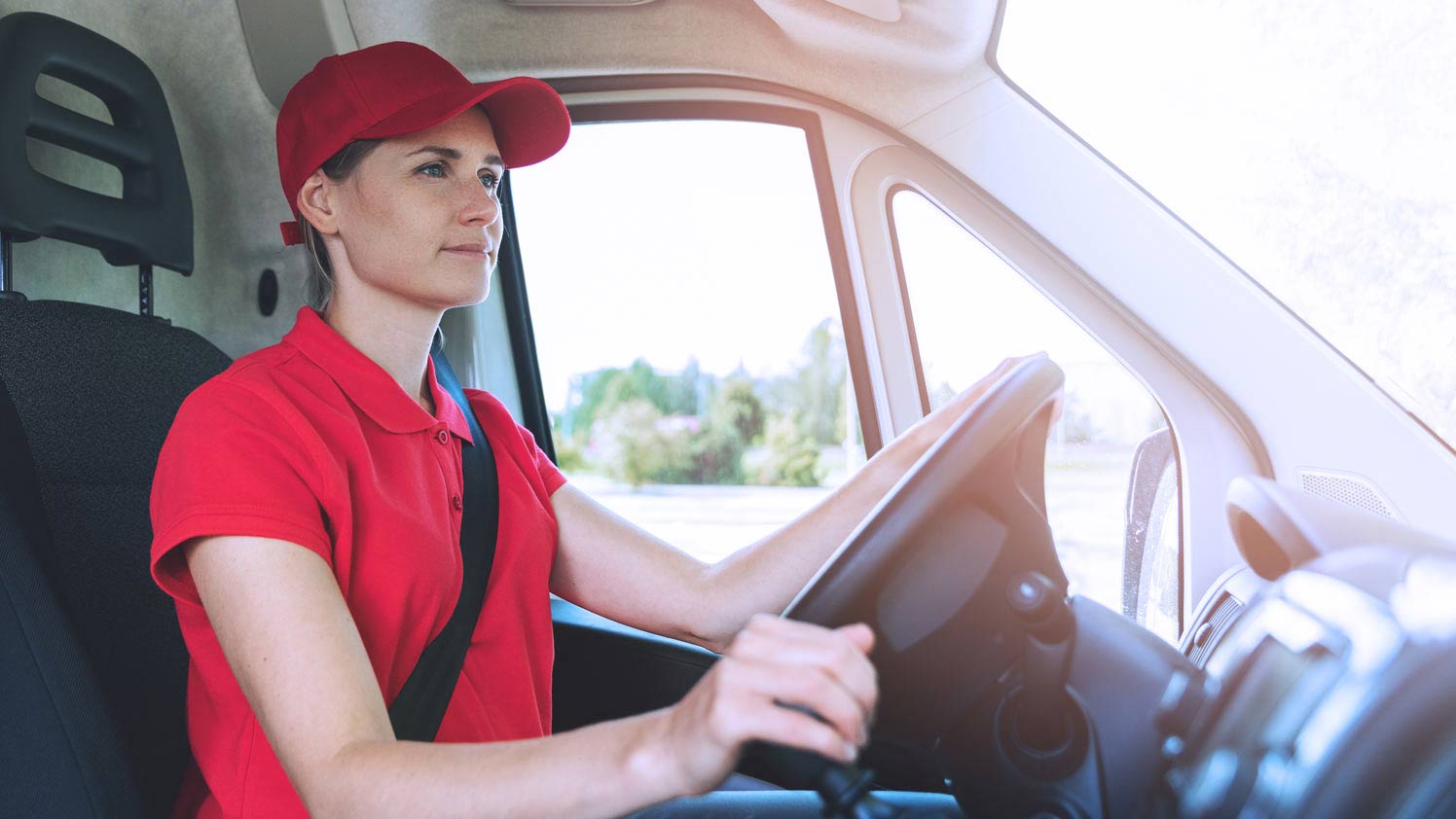 person driving a van