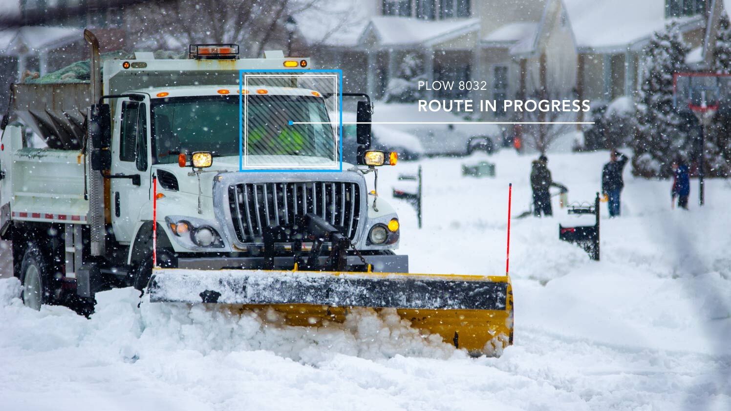 snow plow in a suburb