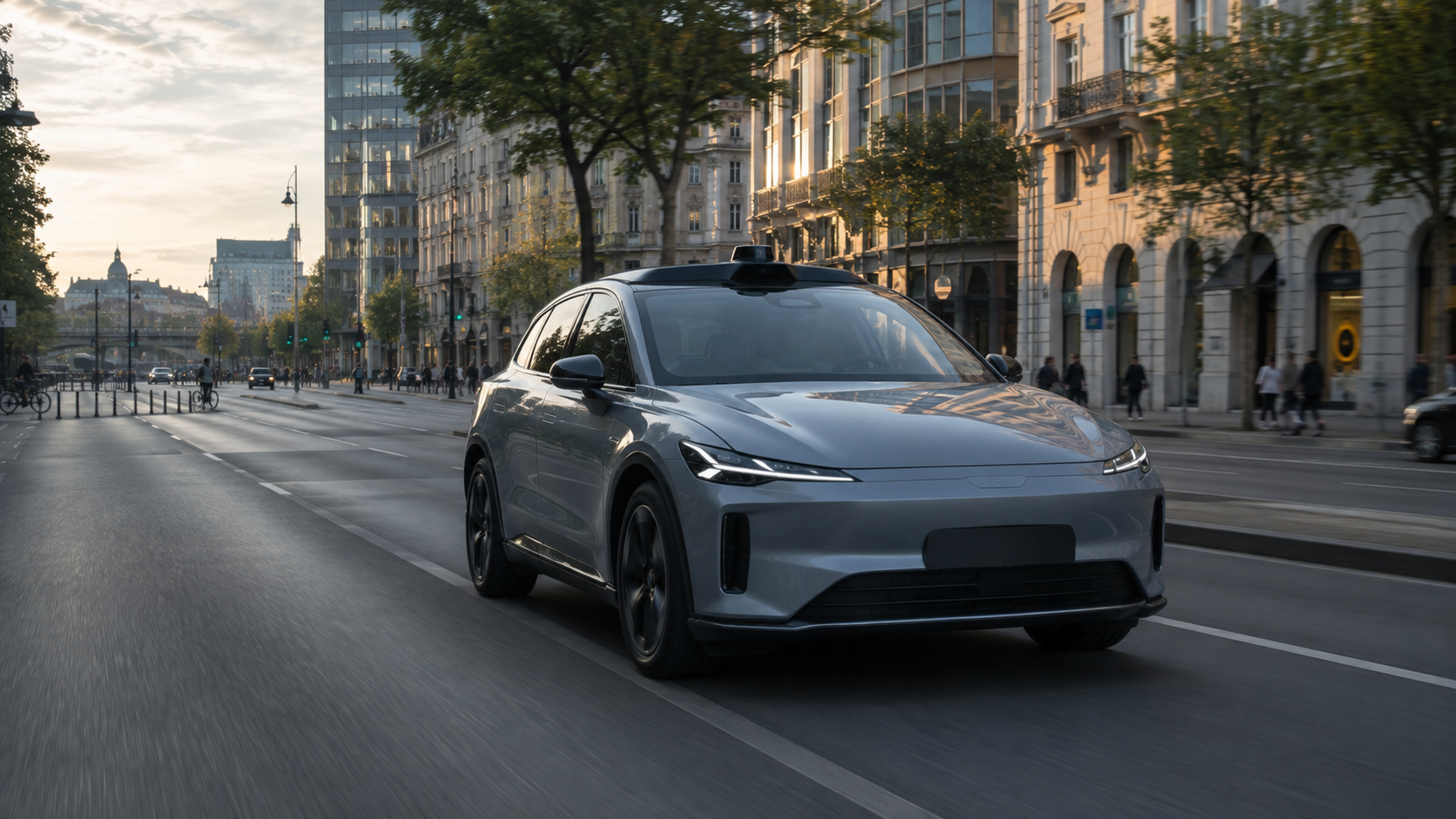 Autonomous electric vehicle driving through a European city at golden hour.