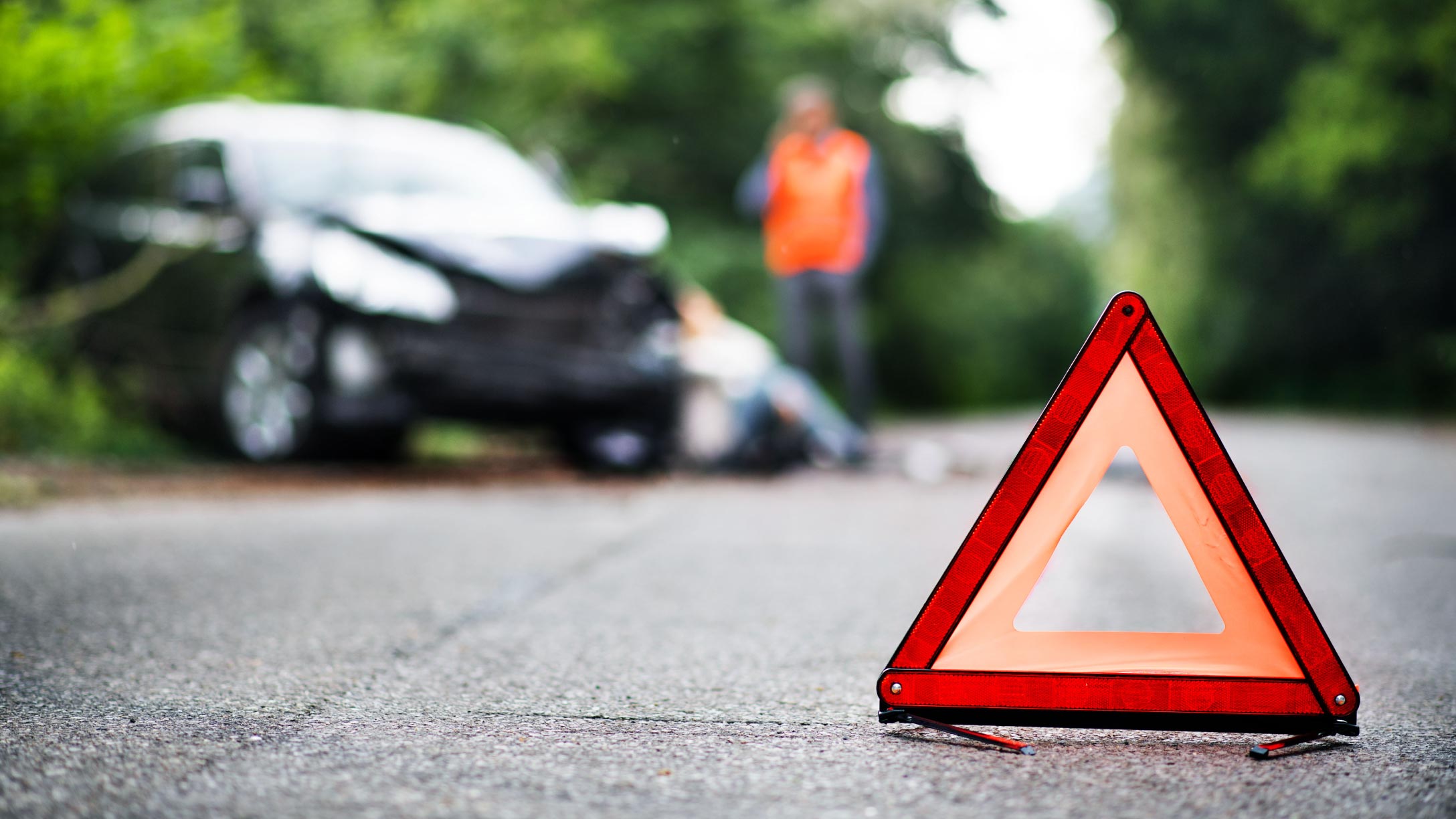 car crashed on side of the road