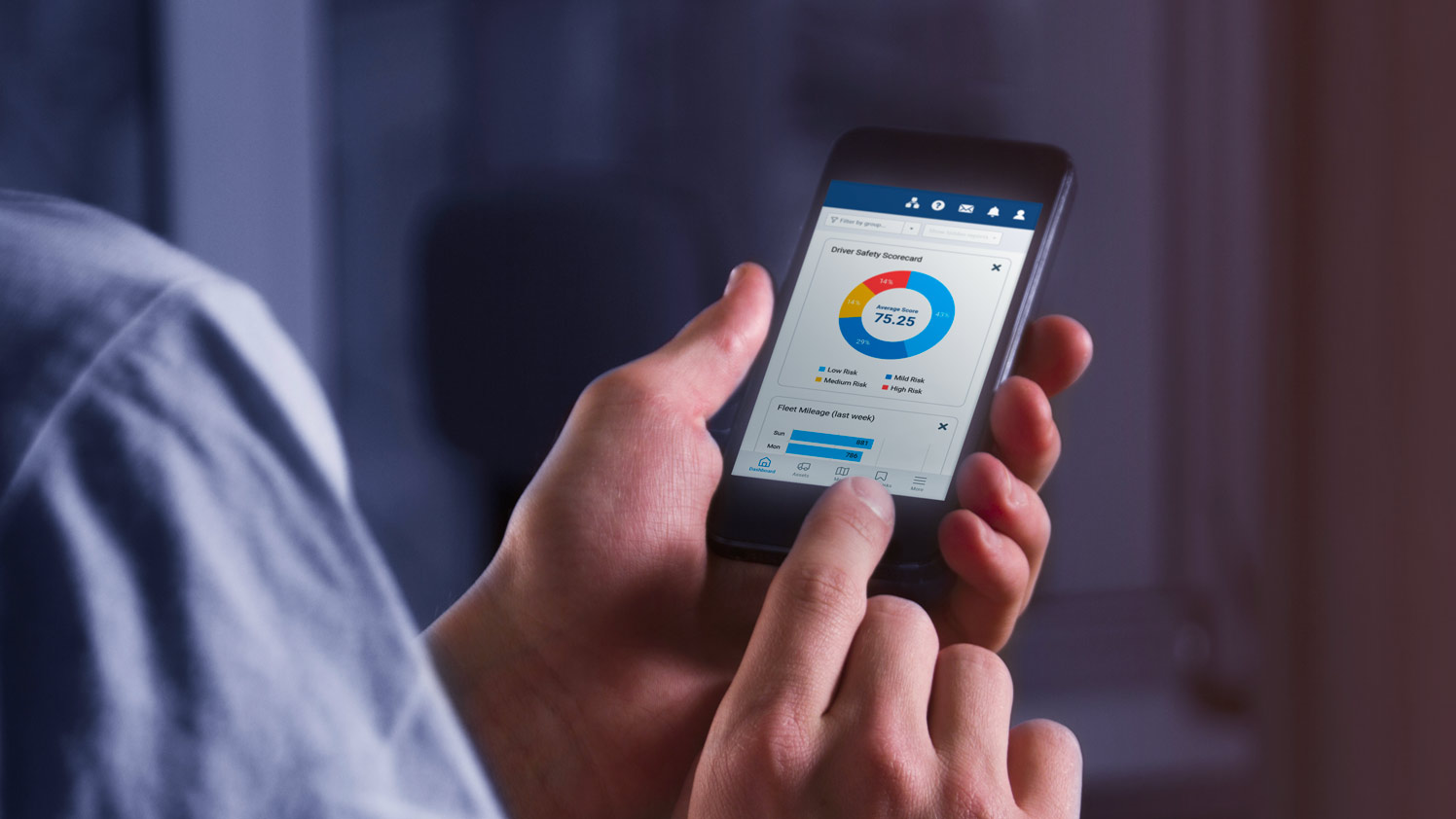 Person using mobile phone to check Driver Safety Scorecard in MyGeotab