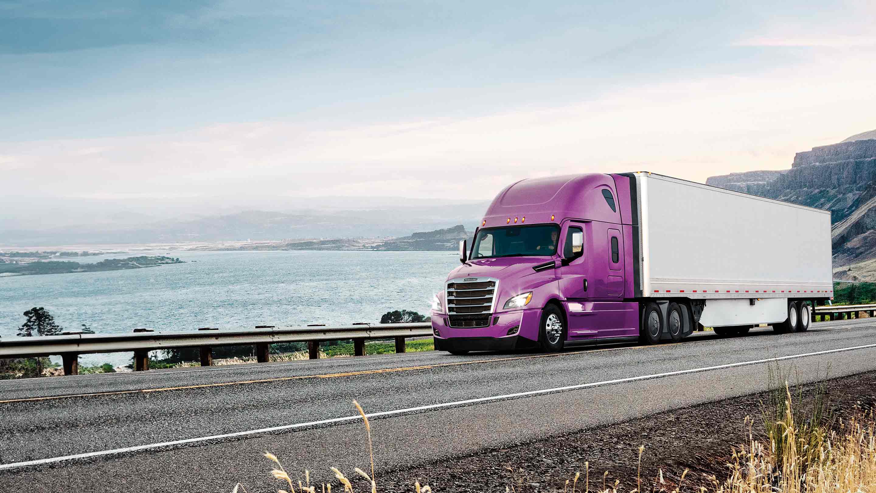 Truck driving down the road