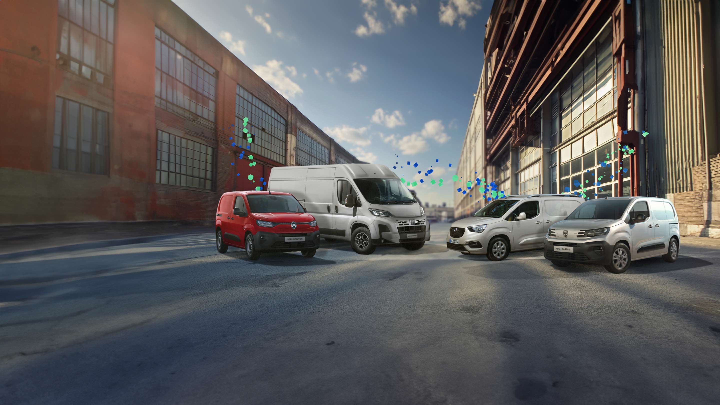 four mobilisights vehicles lined up together on a street