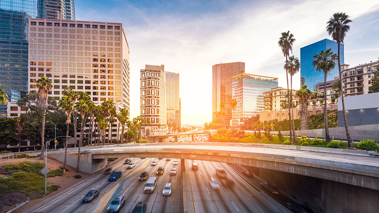 Sunny street in California with buildings in the background