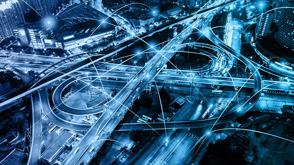 Blue filtered picture of vehicles on road