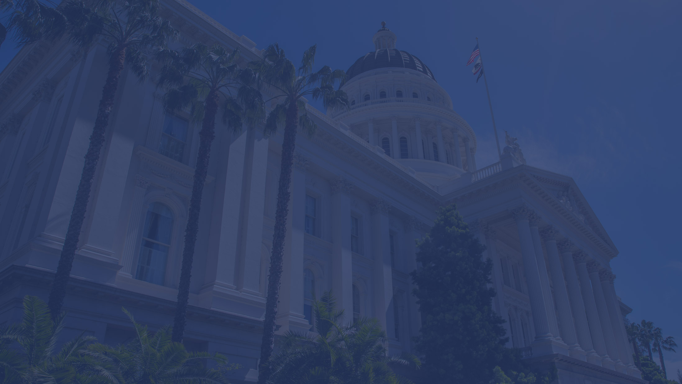 Faded blue background of California government building 