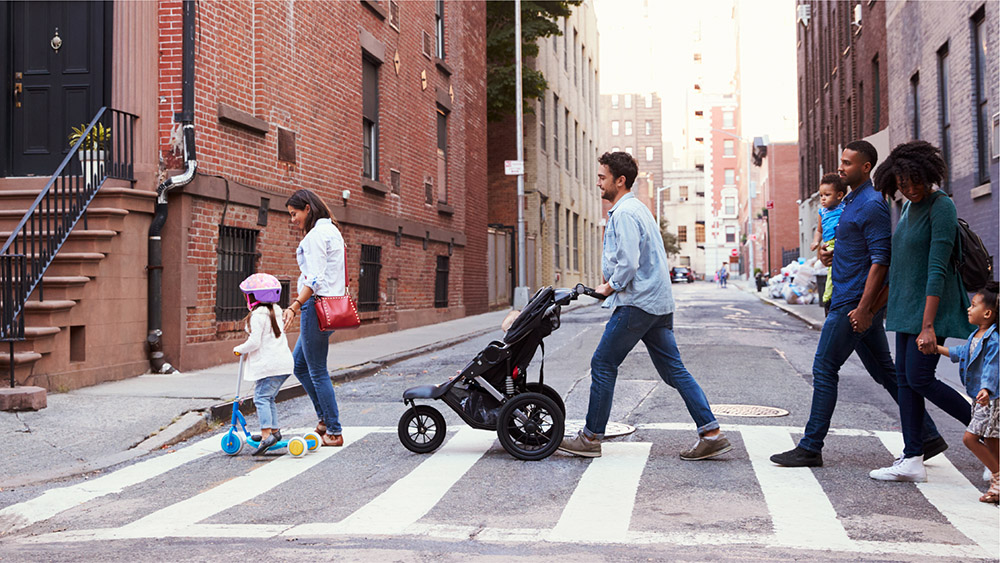 People crossing the street at crosswalk