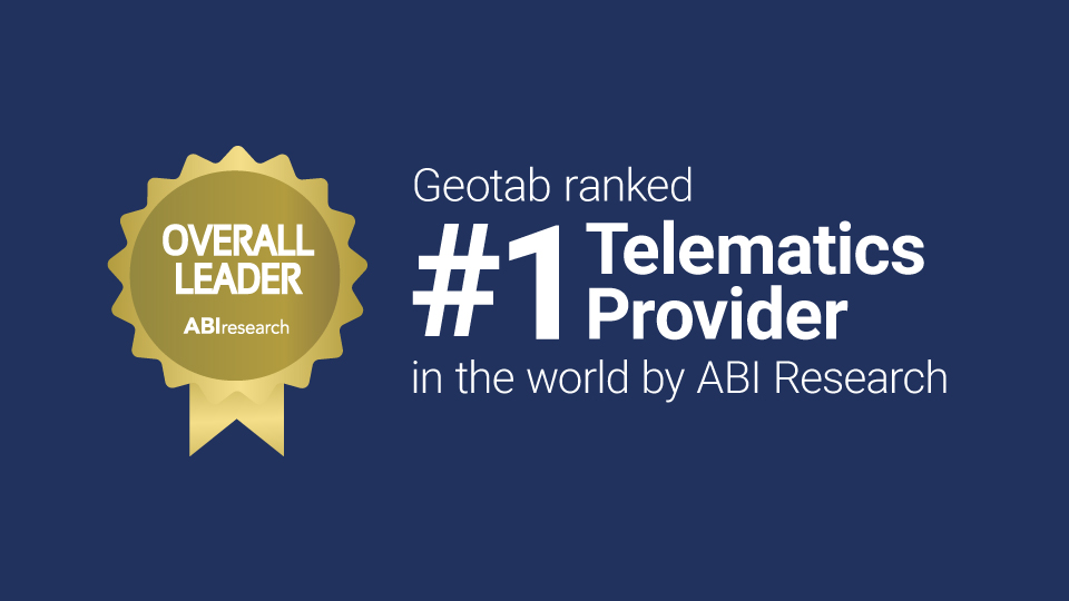 A gold ribbon that says "overall leader" on a dark navy blue backdrop beside white text that reads "Geotab ranked #1 Telematics provider in the world by ABI Research"