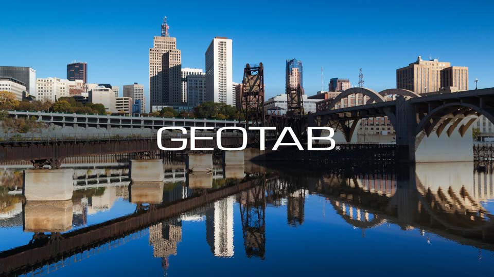 Geotab logo on top of the Minnesota Skyline