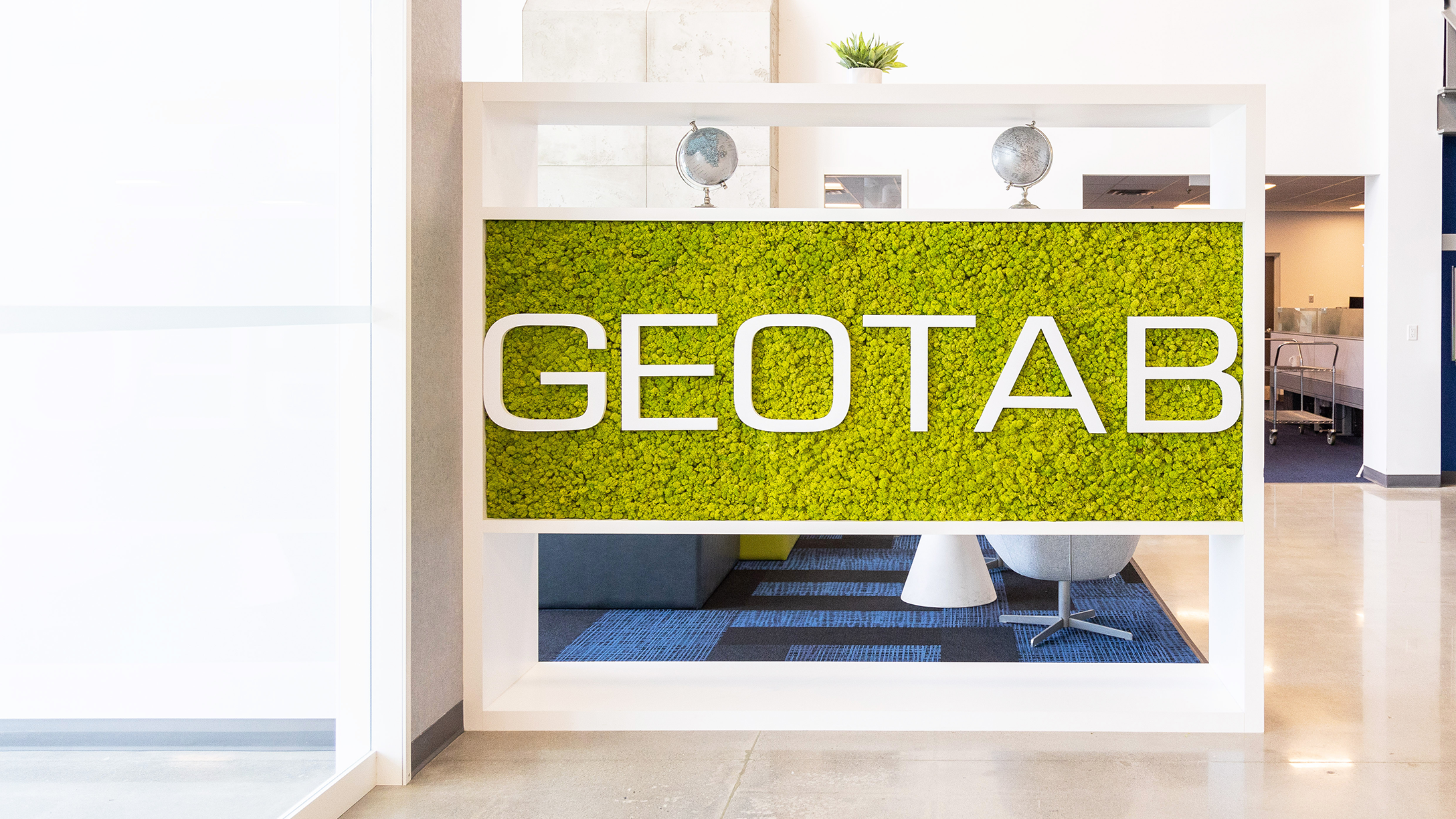 Geotab accepts award from University of Waterloo