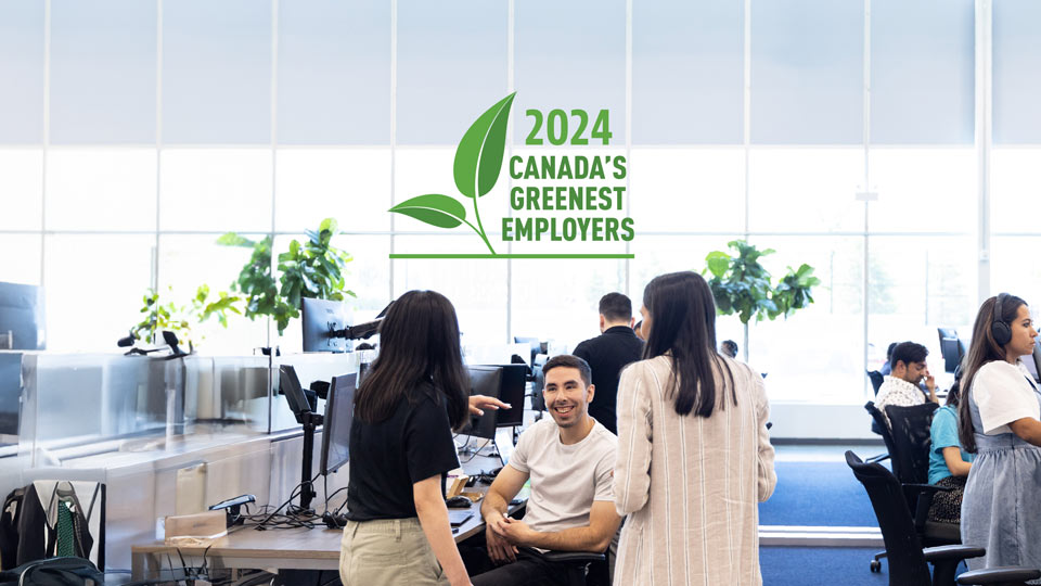 Geotab employee walking in door and Canada's Greenest Employer 2024 logo