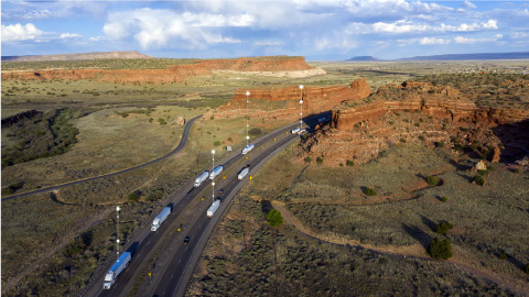 roadway with vehicles driving down it
