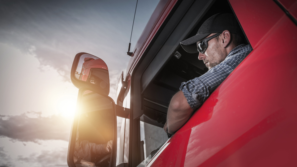 Truck driver looking out a window
