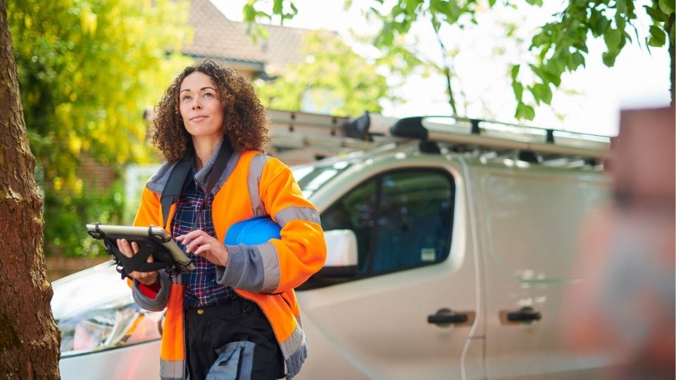 Women in front of truck