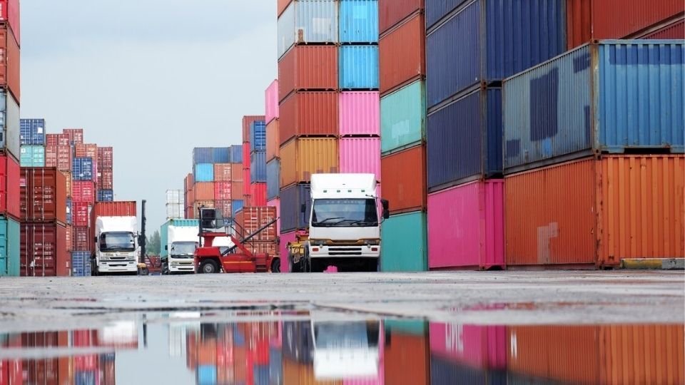 Trucks surrounded by cargo