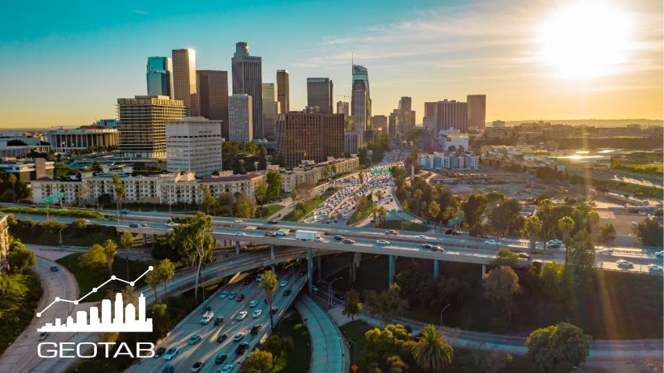 City skyline with data story icon the corner