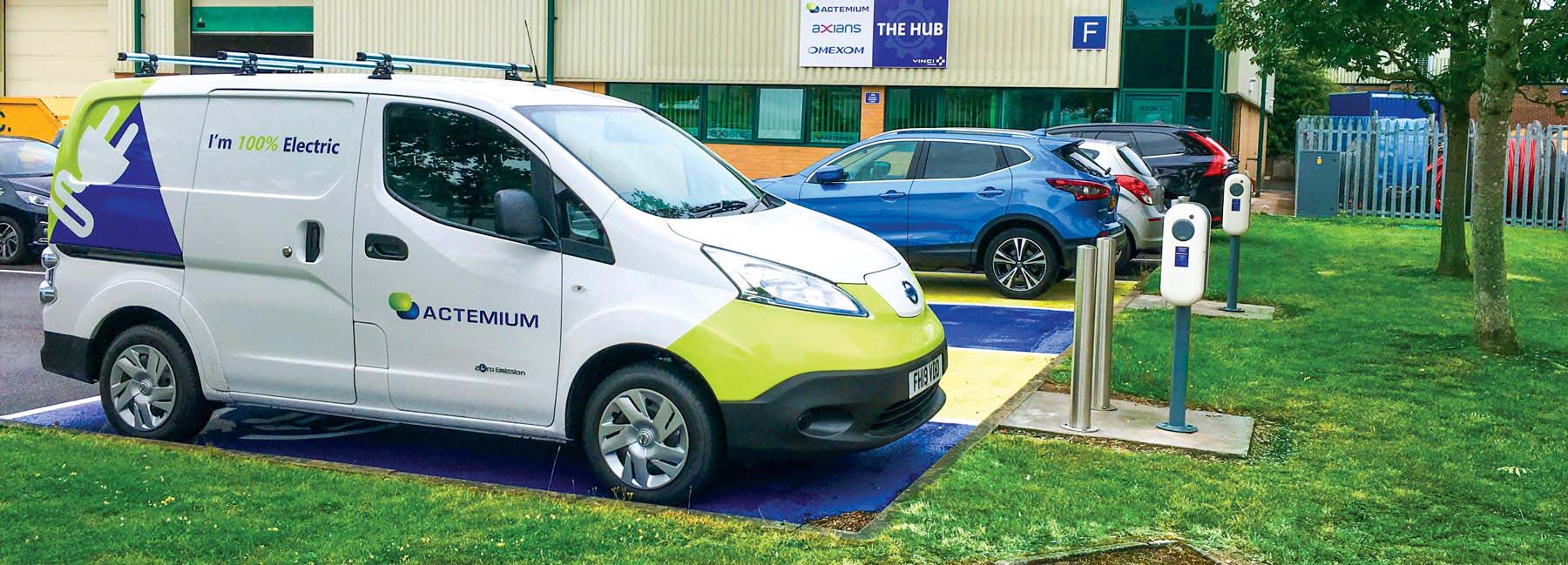 Actemium electric vehicle parked in an EV charging lot