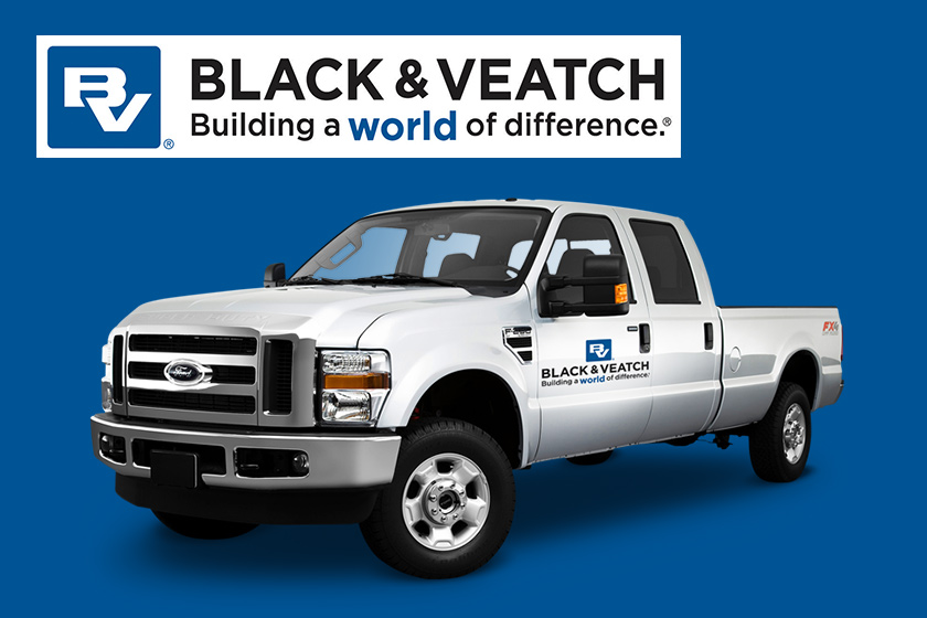 Black and Veatch branded pickup truck on dark blue background