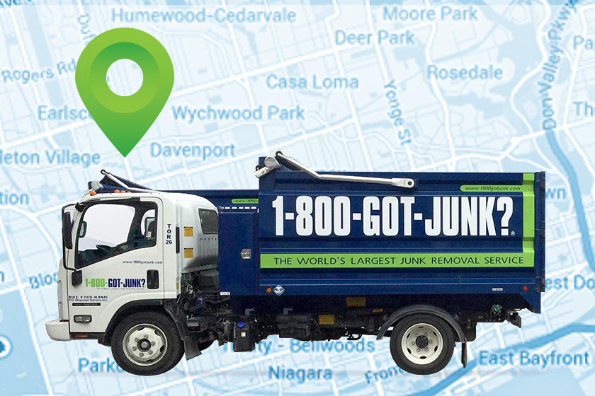 Garbage truck on blue map background with green GPS icon above it
