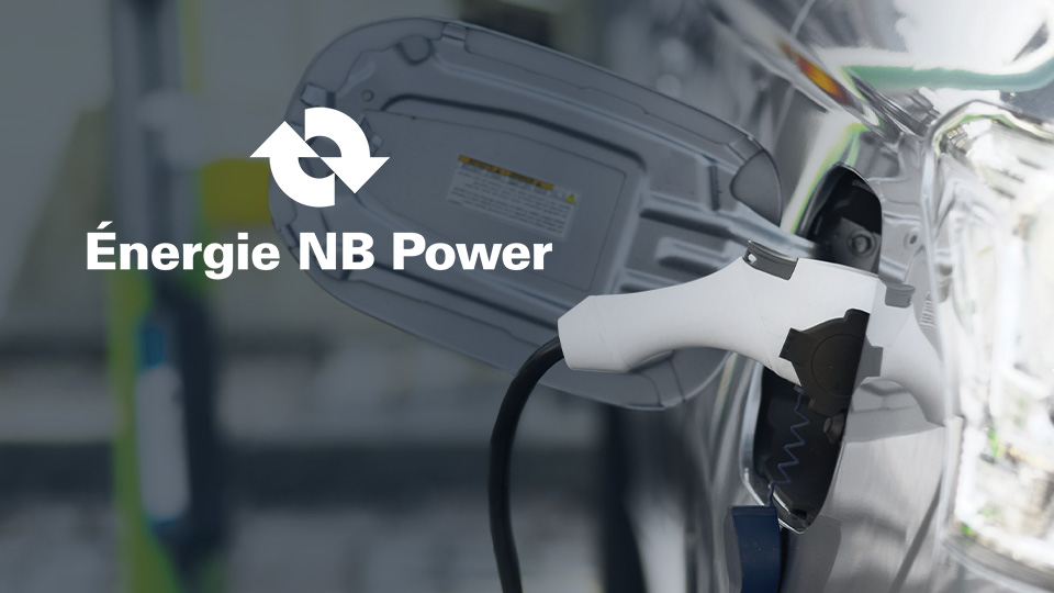 Electric vehicle plugged in with Energie NB Power Logo beside it