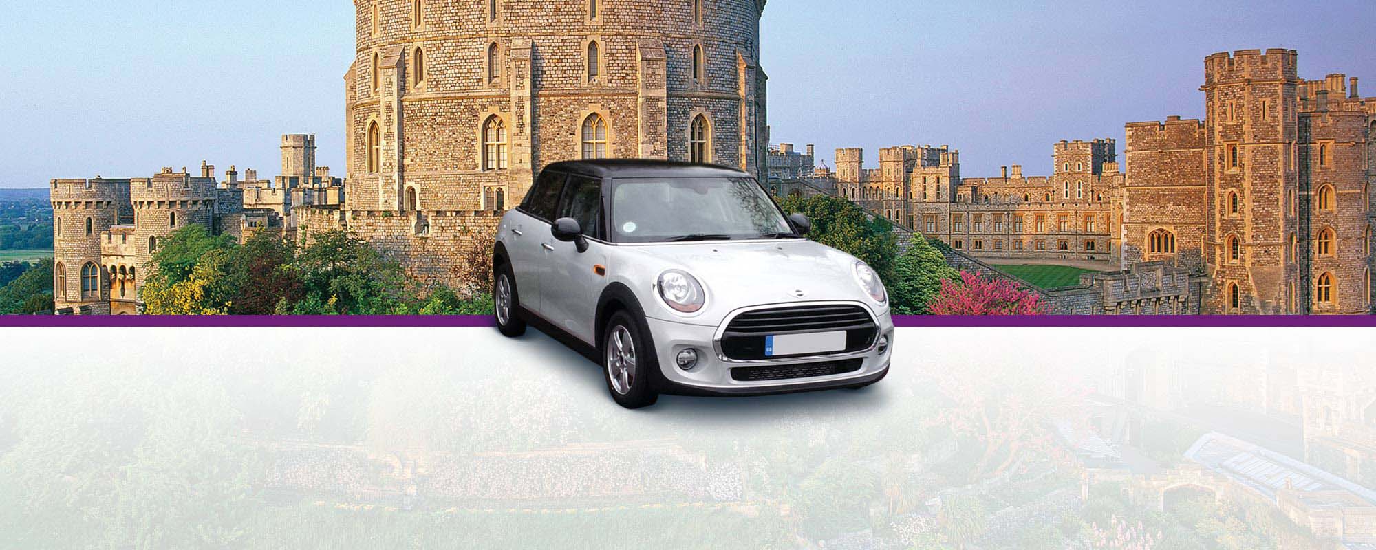 A BMW Mini Cooper superimposed in front of a castle