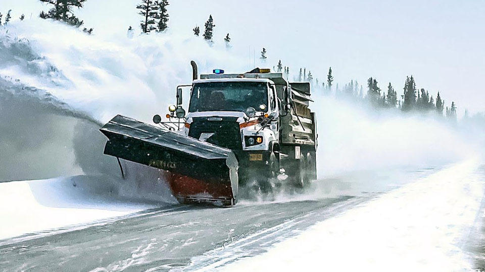 snow plow moving snow