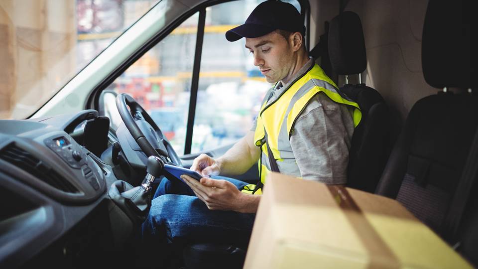 driver checking his device