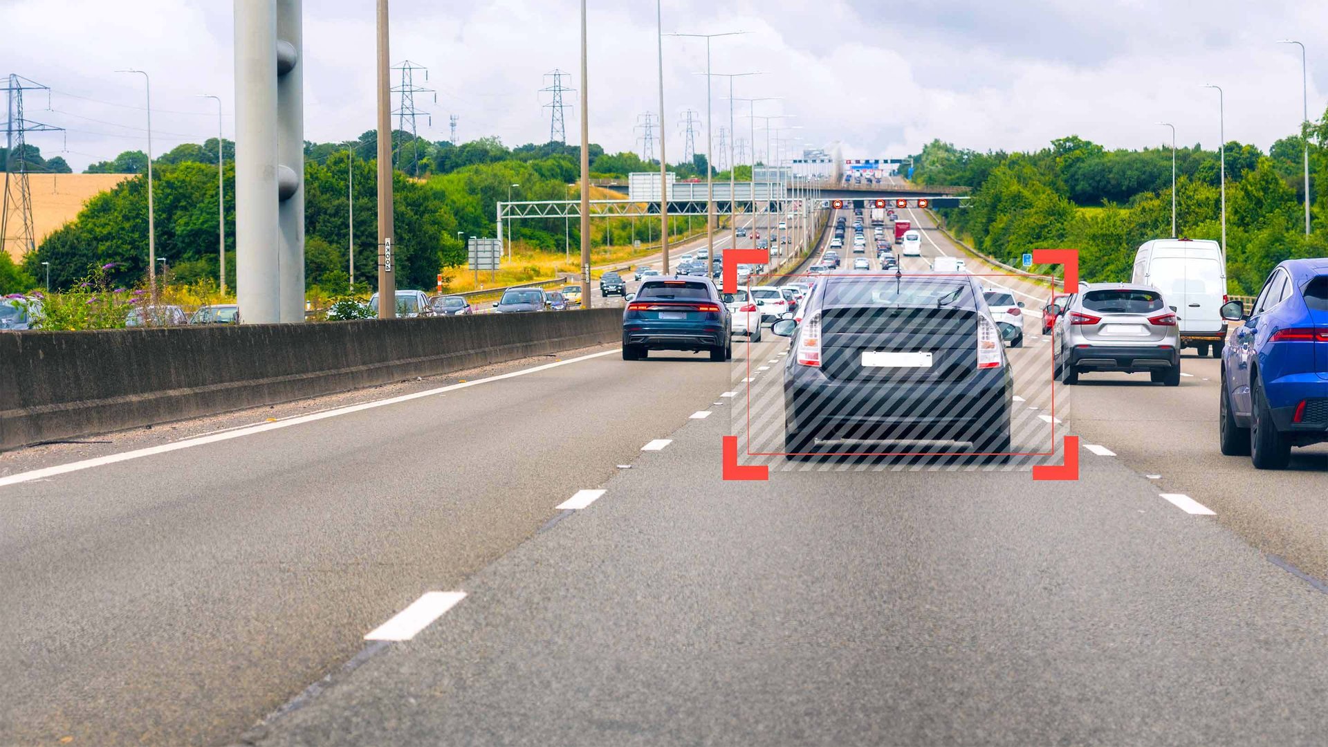 Motorway traffic with a dash cam detection box highlighting the vehicle ahead
