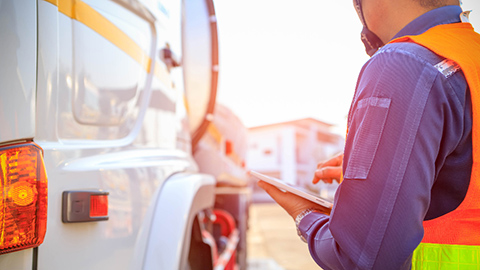 Employee managing their fleet on a tablet