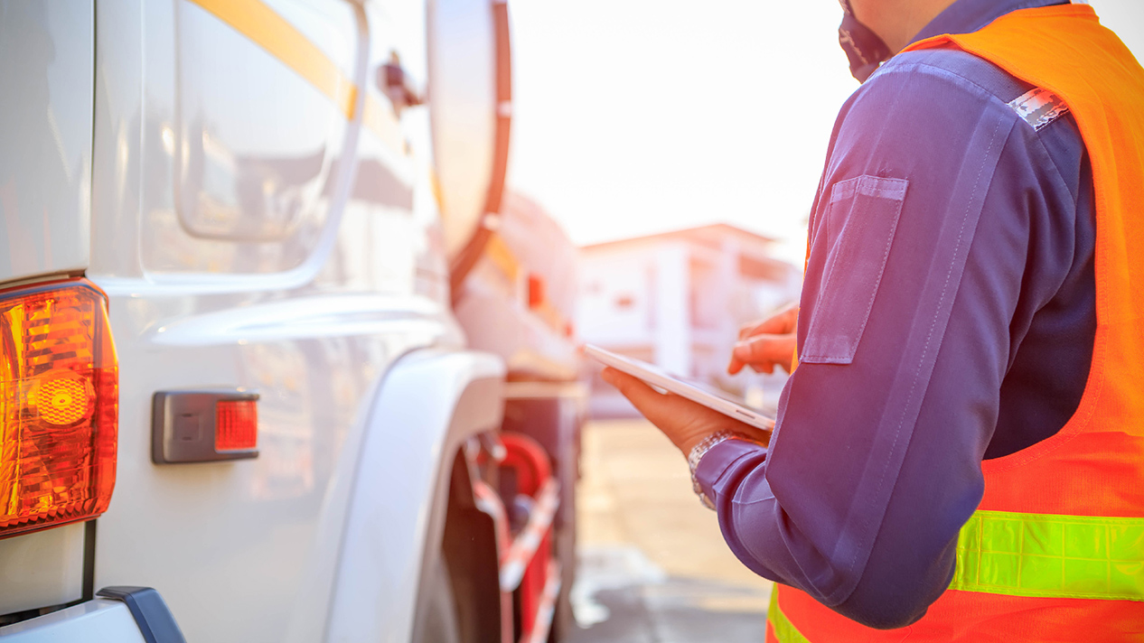 Employee managing their fleet on a tablet