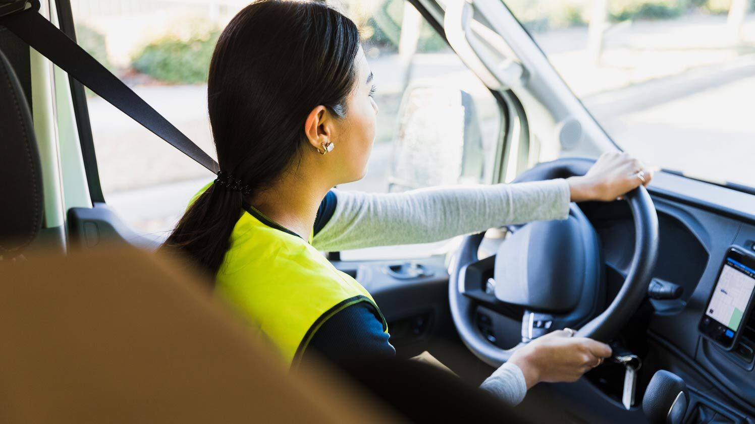woman driving a vehicle