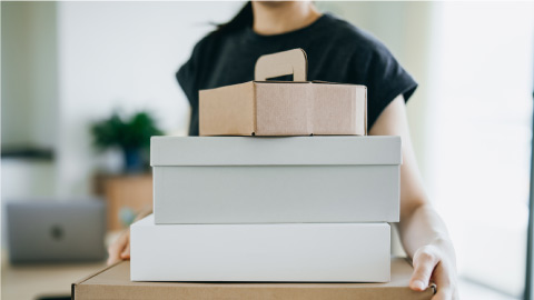 person carrying boxes