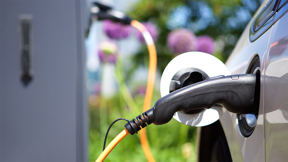 EV plugged into charging station