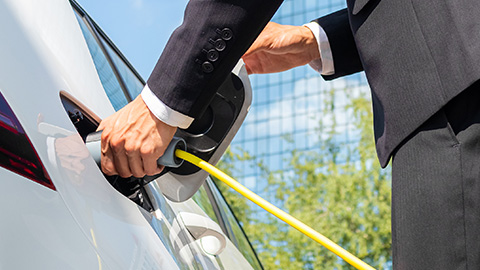 image of someone charging his EV