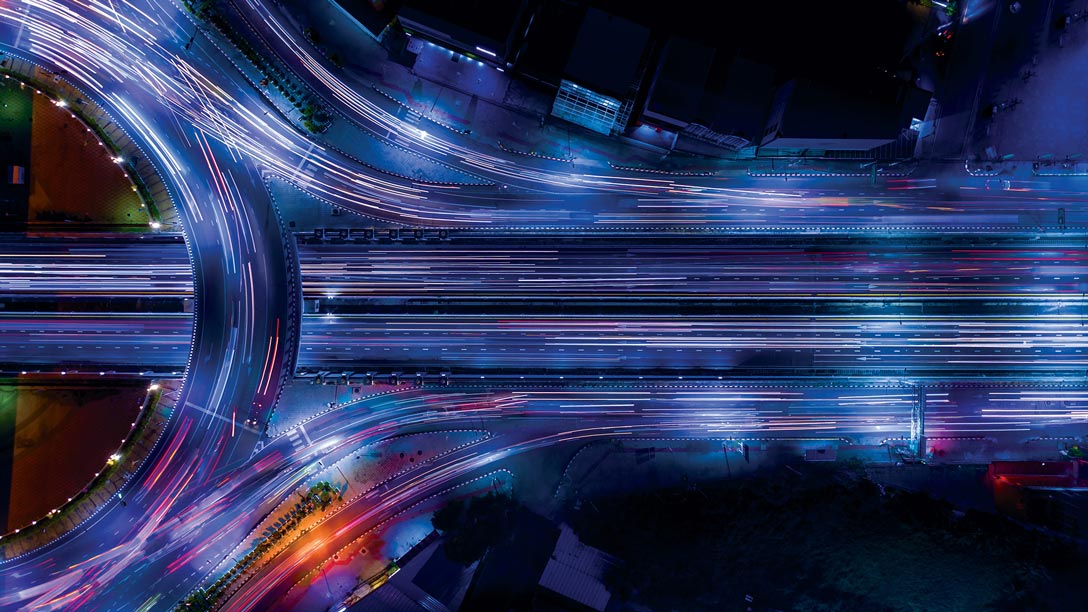 lit up road during night time