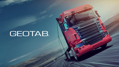 red hgv on road with geotab logo