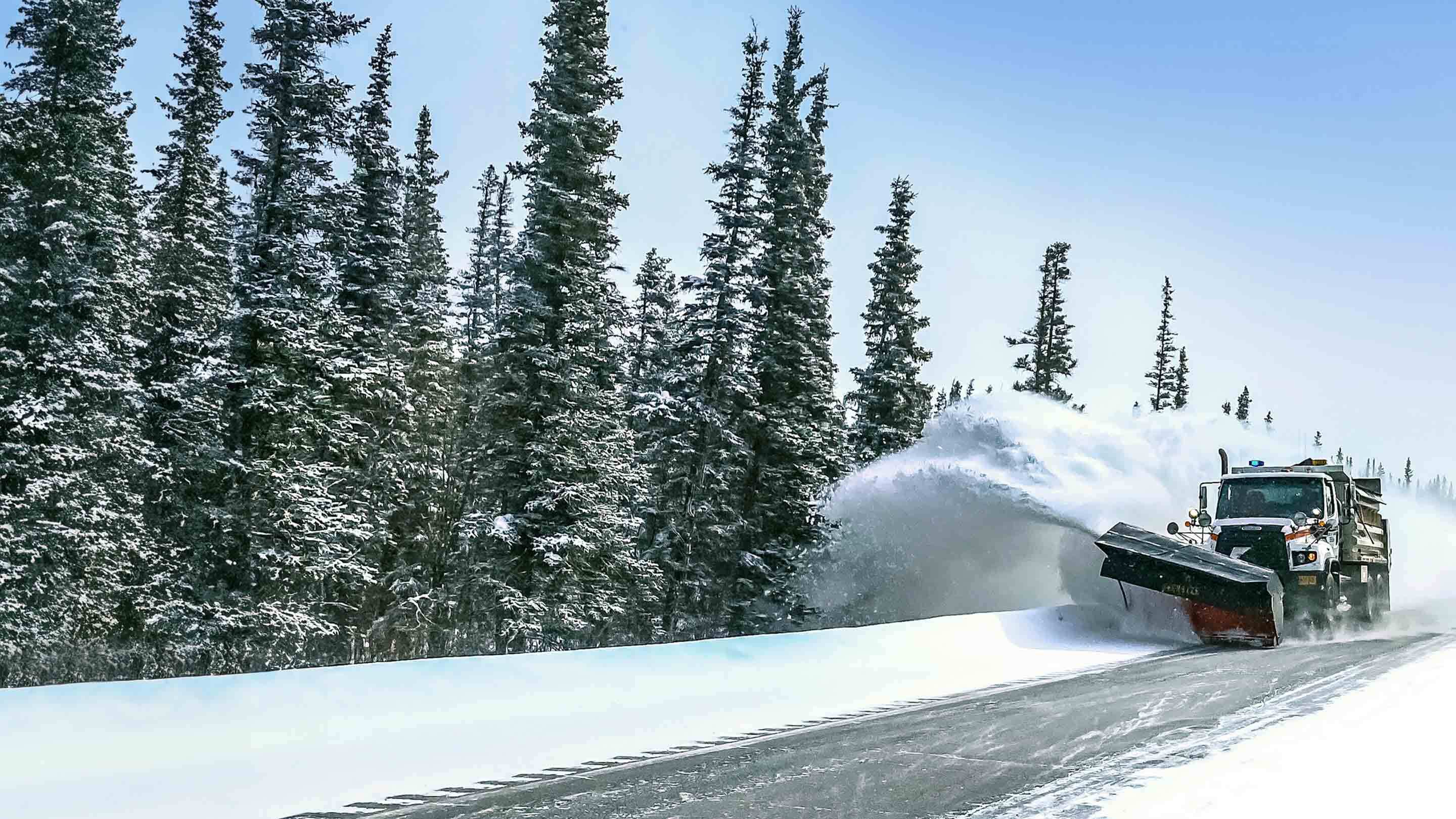 snow plow moving snow