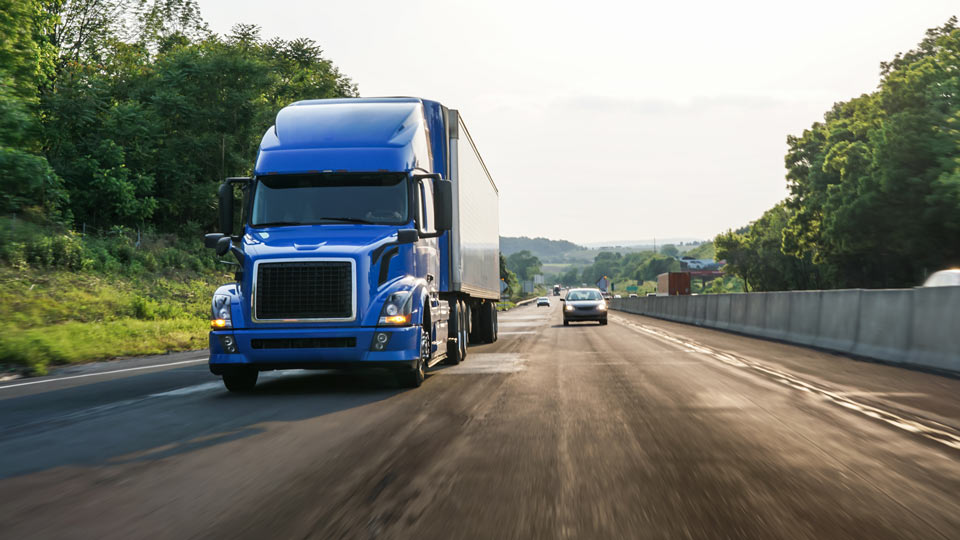 Blue truck on road