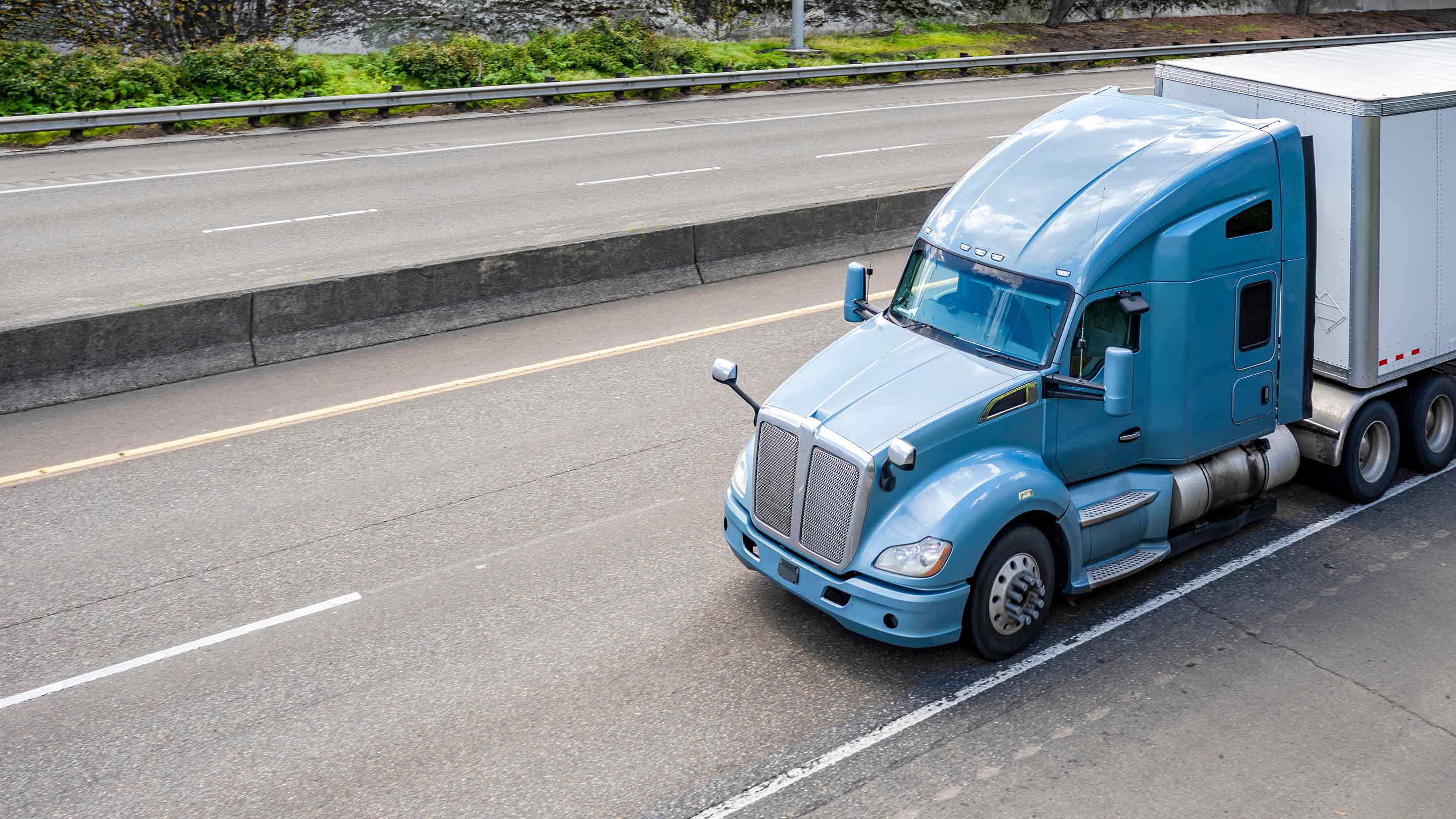 Heavy truck on two lane road